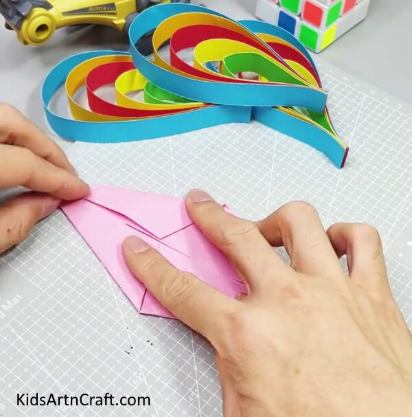 Forming a Diamond Shape - How to Create a Peacock Craft with Simple Paper Strips - Perfect for Young Ones