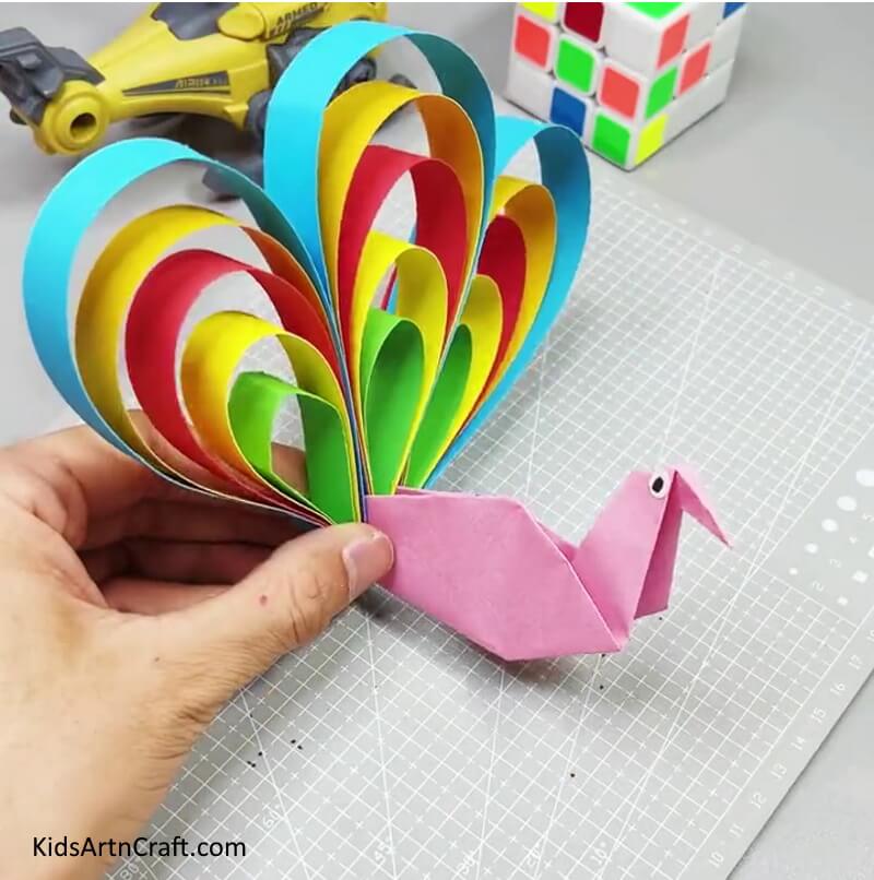 Making paper strips Peacock Craft For Kids