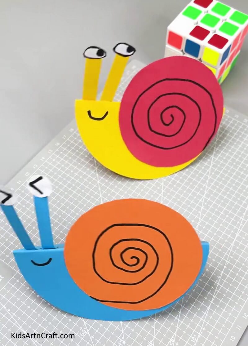 Crafting a paper snail Craft At Home