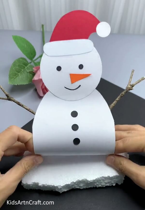 Pasting Snowman On Thermocol Piece - A paper snowman craft is a great idea for kindergarteners. 