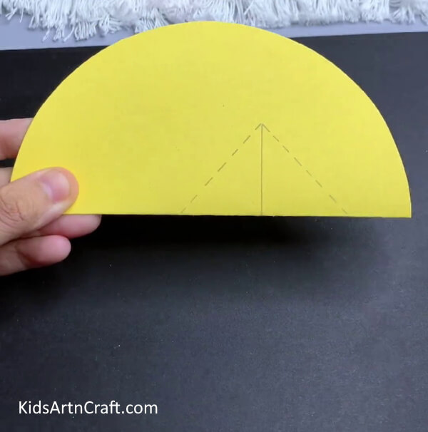 Marking The Cuts - Learn to construct a paper lemon and chick for the time of spring.