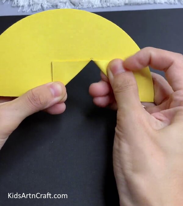 Folding Dotted Lines - Instructions for putting together a paper lemon and chick for the spring season.