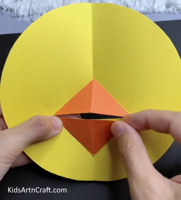 Pasting The Beak - Directions for making a paper lemon and chick for the springtime.