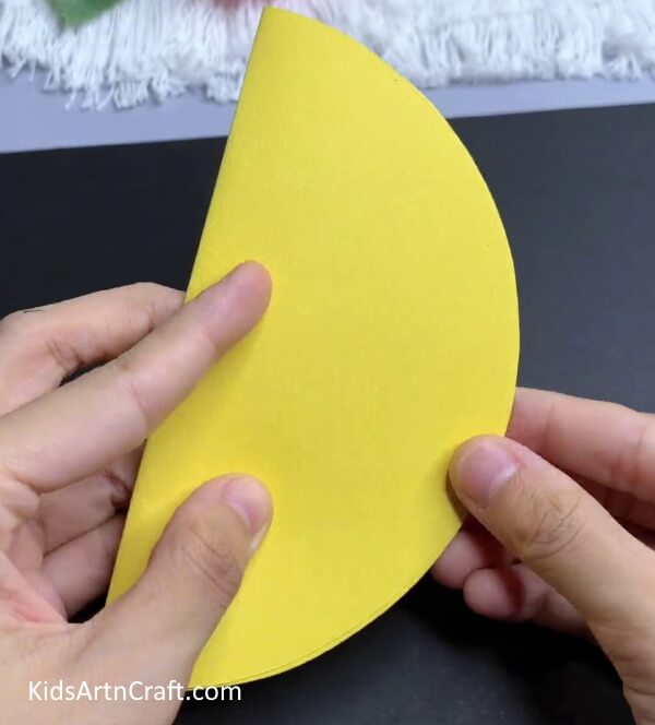 Making Folded Paper Lemon - Guide on constructing a paper lemon and chick for the coming of spring.