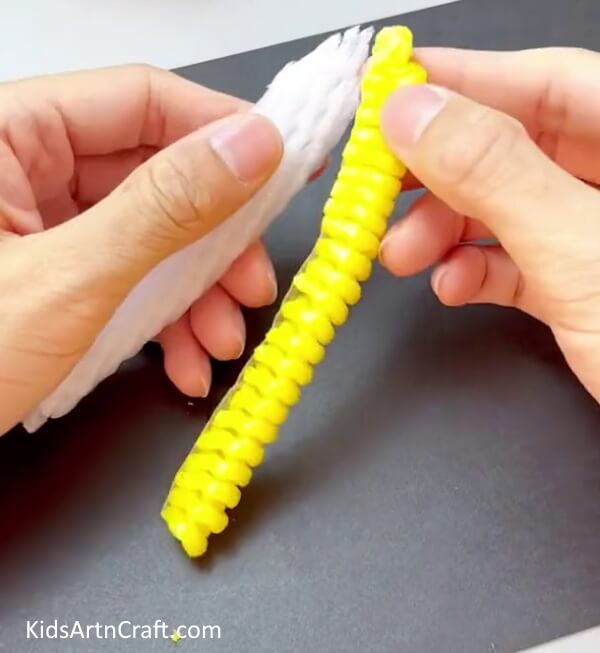 Pasting The Corn Layer on the White Rolled Foam - Constructing a Corn Project With a Fruit Foam Net