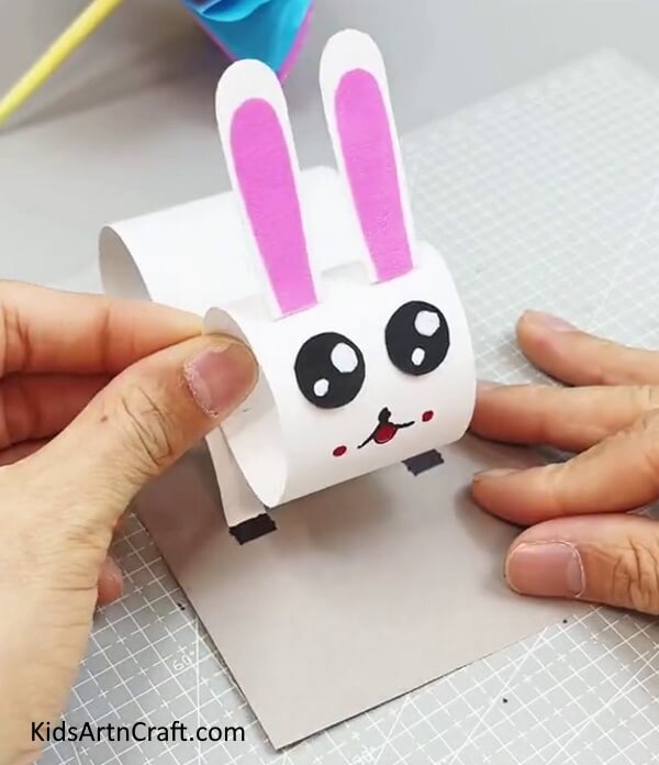 Pasting Face On The Body - Instructions to Form a Bunny Out of Paper: Step By Step Guide