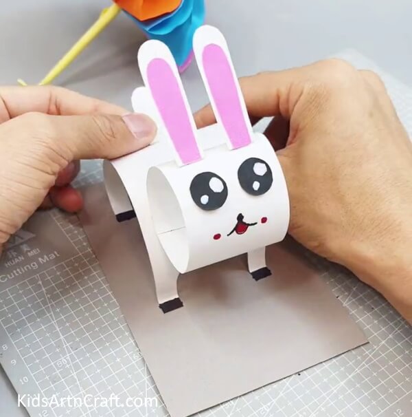 Pasting Tail - Here is a guide on how to make a cute bunny out of paper, with step-by-step directions.