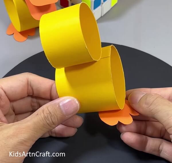 Making Legs Of Duck - Kids can have a blast making paper duck toys. 