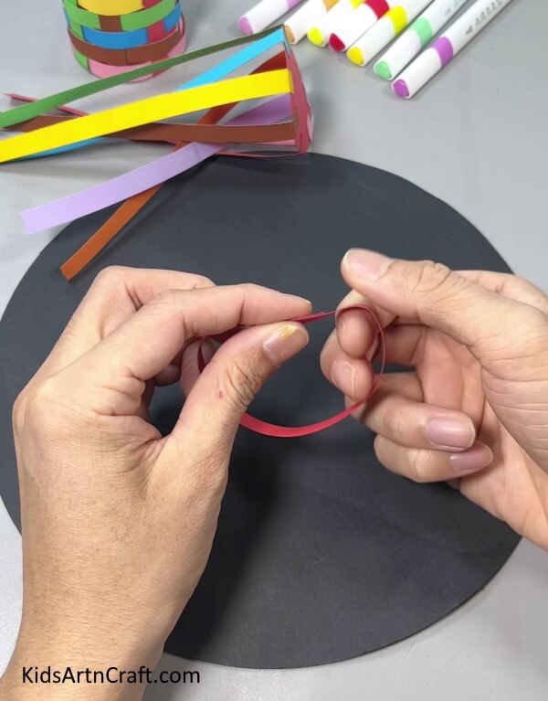 Folding Paper Strip End To Form A Circle - Developing a Pen & Pencil Holder Out of Paper Strips