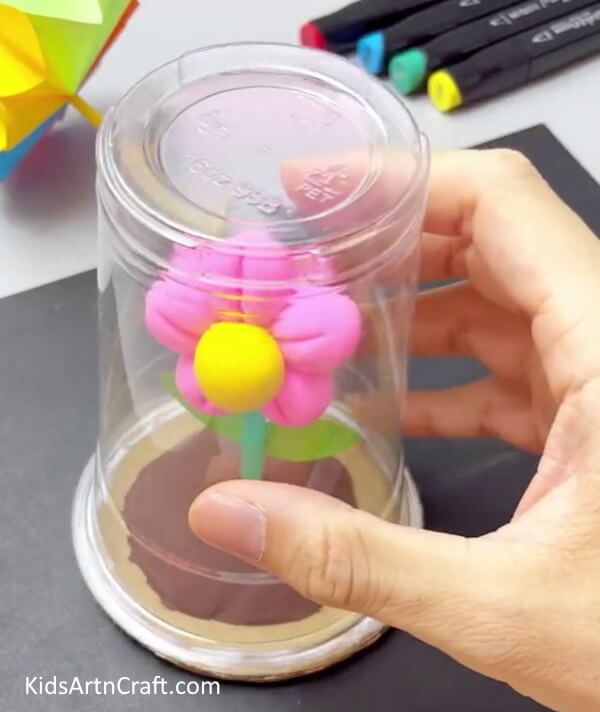 Pasting Glass On The Circle - Crafting Clay Flowers is a Snap with this Guide for Kids 