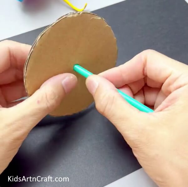 Inserting The Straw Through The Hole - An Easy Tutorial for Kids to Make Clay Flowers 