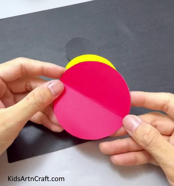 Cutting Out A Red Circle - Create a Straightforward Ladybug Creation For Little Ones