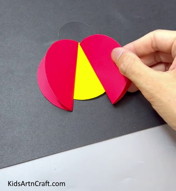 Pasting Another Red Circle - Design An Uncomplicated Ladybug Craft For Kids
