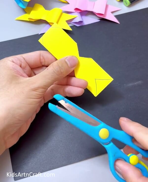 Drawing Triangles On the Sides - Make a Do-It-Yourself Paper Bow Project for the Kids