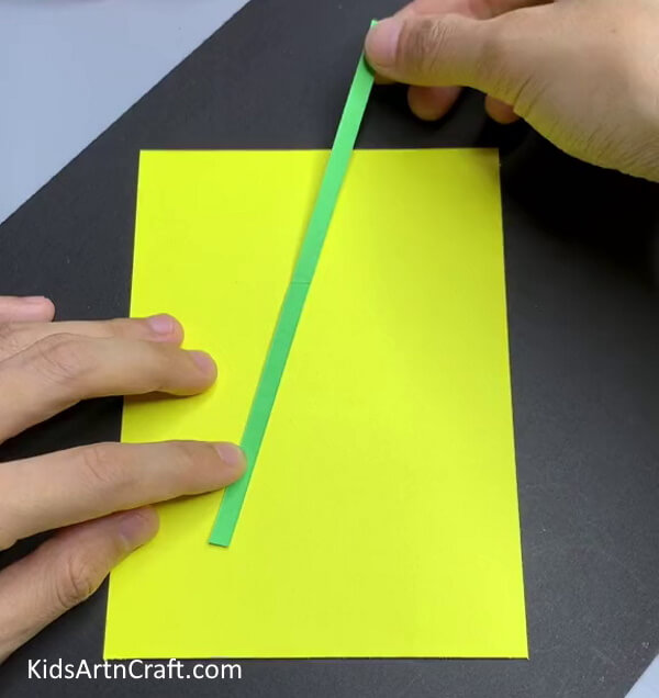 Pasting a Green Strip On Yellow Paper - A Quick and Simple Card-Making Idea with Cherries