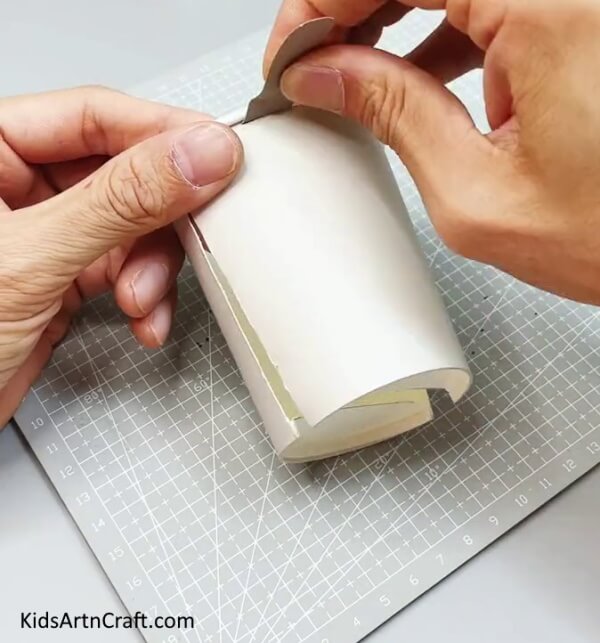 Cutting Paper Cup and Inserting Cardstock - Reusing Paper Cups to Create an Animal Craft For Children