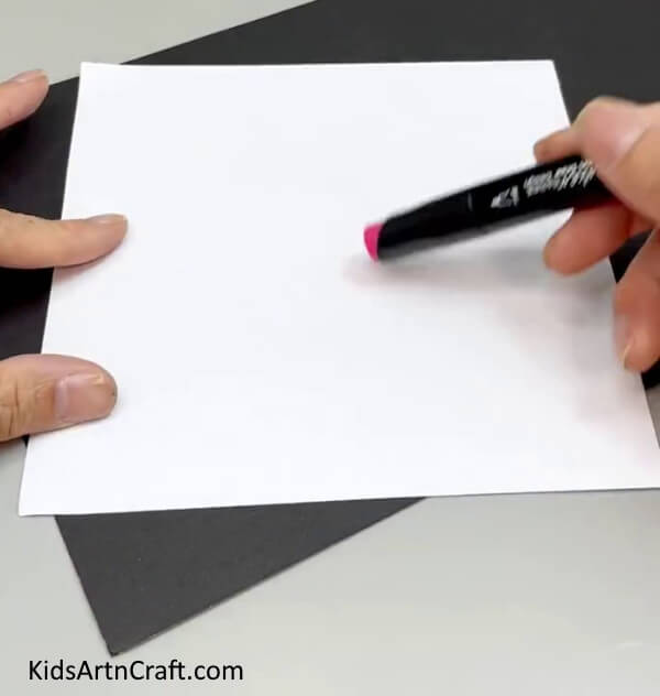 Taking A piece of Paper And Sketch a Pen - Constructing a Paper Doll Activity For Kids