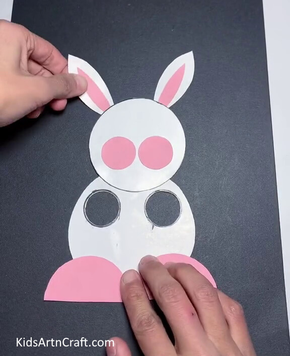 Pasting The Ears On The Bunny Implementing a simple paper bunny craft in a few steps
