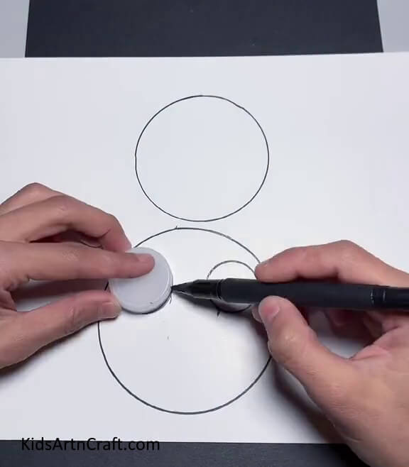 Drawing Two Small Circles Inside the Larger Circle Achieving a simple paper bunny craft with ease