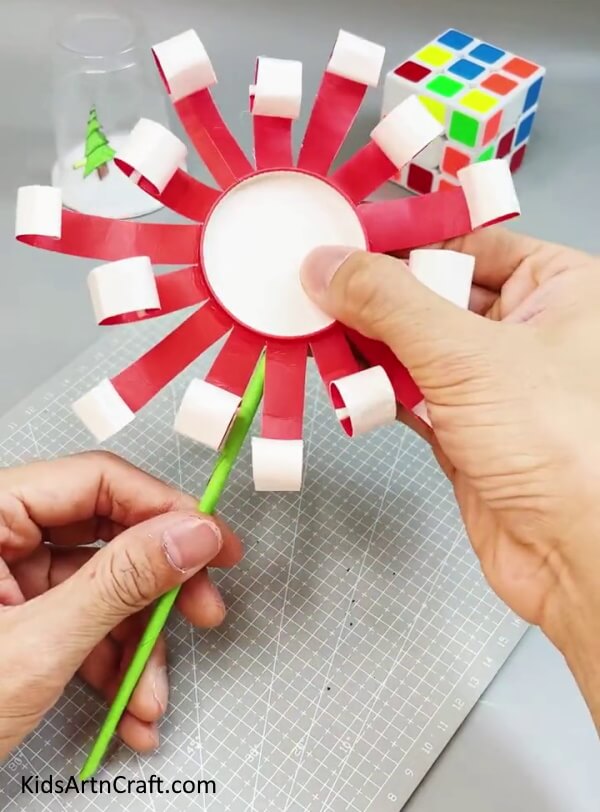Pasting the Paper Stem to the Flower - Creating a Sunflower with a Revived Paper Cup