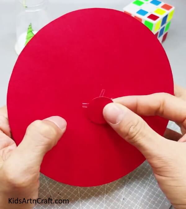 Sealing The Straw Strands With A Circle - A Tutorial on Building a Paper Clock with Kids