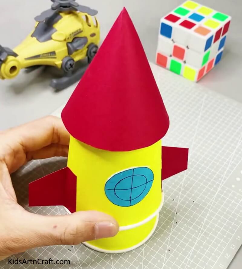 This Is The Final Look Of Our Paper Cup Rocket Craft! -An entertaining project for young ones that repurposes paper cups to make a rocket.