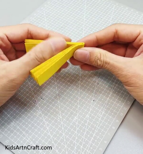 Folding Paper Strip In Half - An Entertaining Paper Fan Toy Craft That Children Can Create