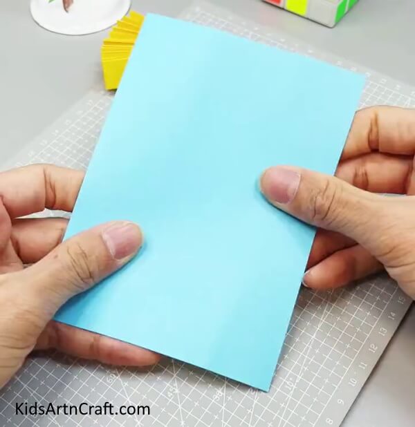 Getting A Blue Rectangle Paper - Creating a Paper Fan Toy Craft for Kids to Have Fun With