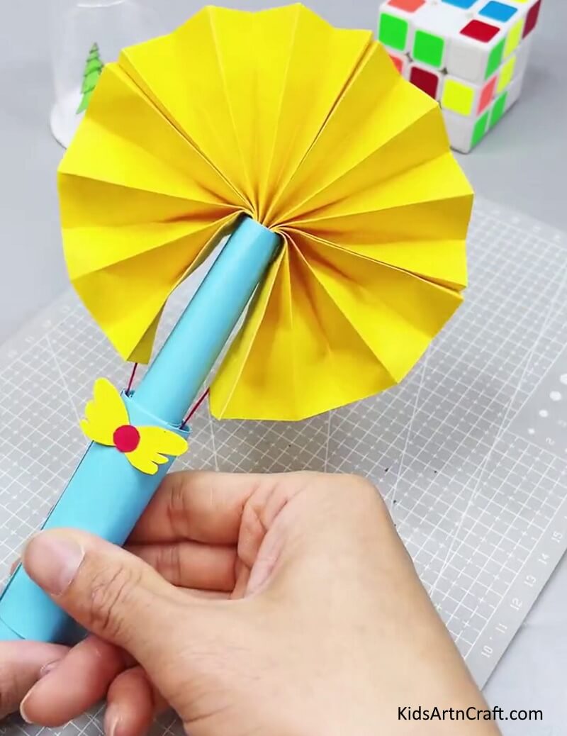 Magic Paper Fan Toy Craft Is Ready To Play! - Fabricating a paper fan toy craft for children to have fun with.