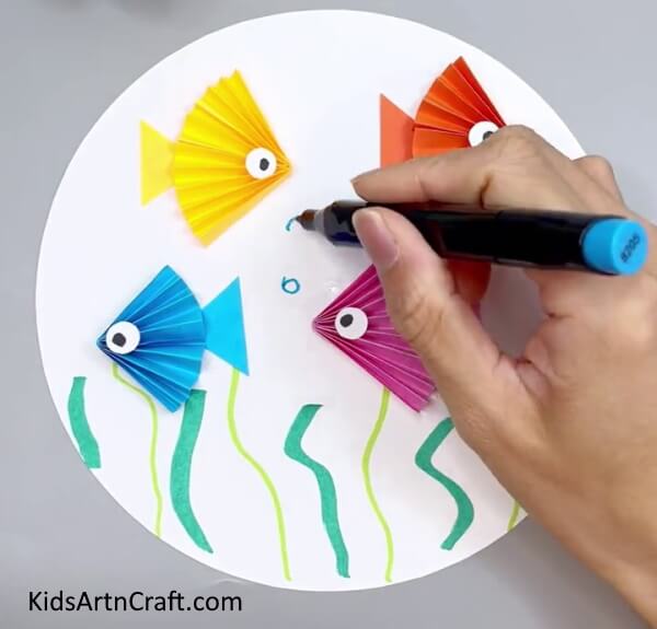 Drawing Bubbles - Make an Eye-Catching Fish Out of Paper With Your Kids In Your House