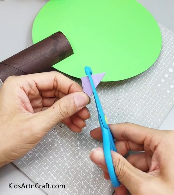 Cutting Petal Shape - Instructions for Crafting a Paper Flower Tree with Children 