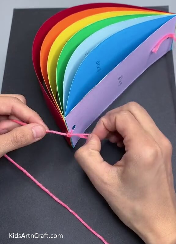 Tying Pink Thread To The Rainbow- Tutorial to Produce a Rainbow Cloud Out of Paper Strips