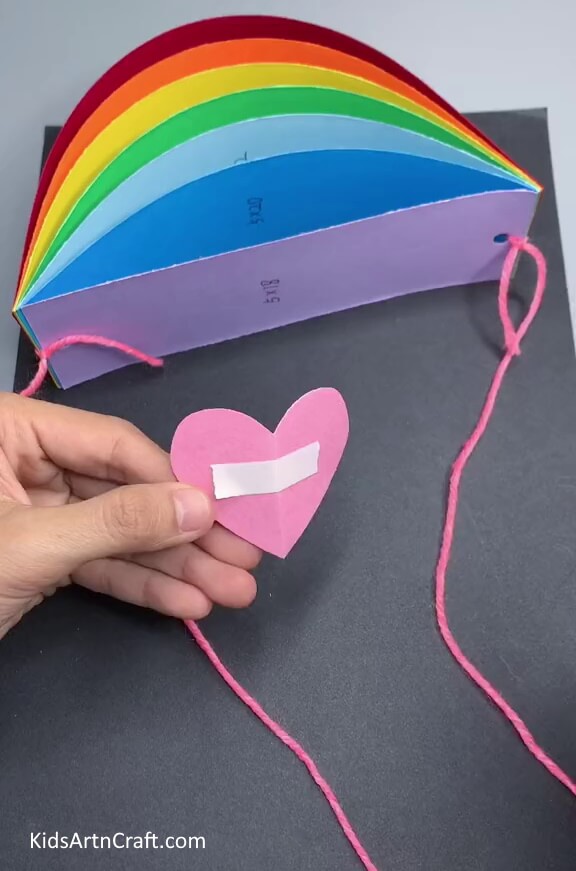 Cutting a Pink Heart- How to Construct a Rainbow Cloud with Paper Strips 