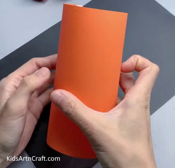 Taking an A4 Size Orange sheet - Assembling a Paper Tiger as a Kids Craft Project