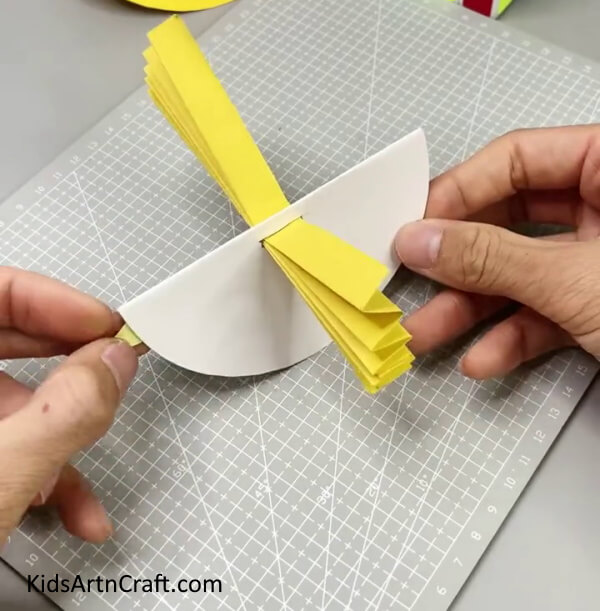 Pasting Beak Of Bird - Developing a Handmade Rocking Paper Bird For Little Ones