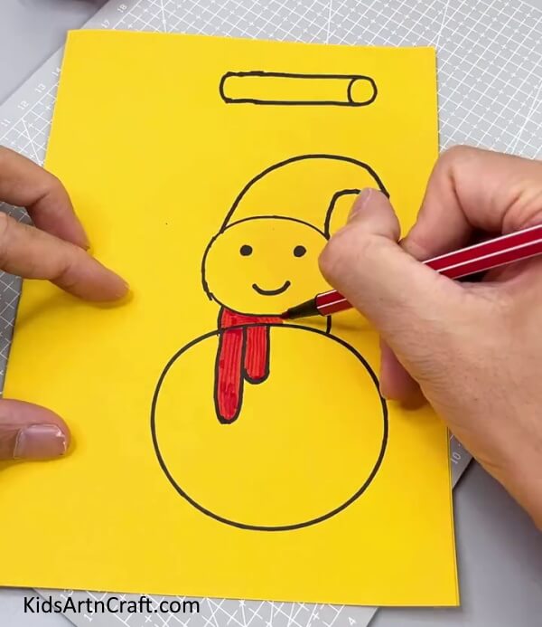 Completing The Snowman Drawing -Making a snowman out of paper - a do-it-yourself guide for kids