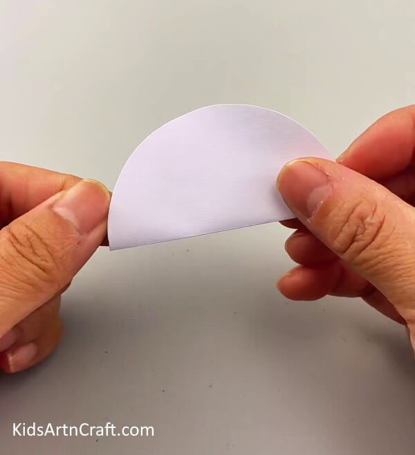 Folding The Circle Into Half- 3D Snowman Construction Paper Tutorial For Kids