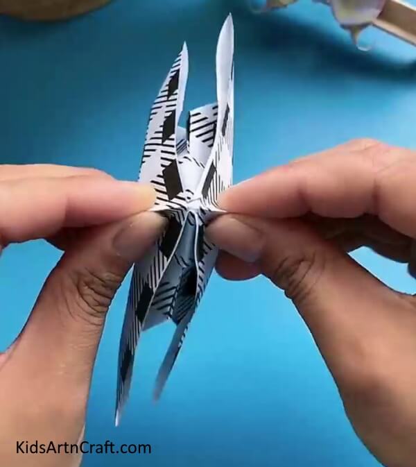 Join Both The Ends-A tutorial on how to make a paper butterfly with kids.