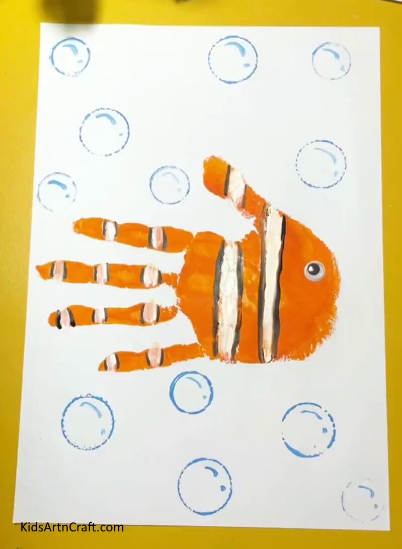 A Simple Fish Craft Using Handprint For Kids