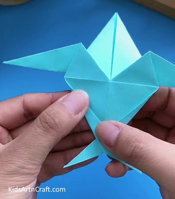 Repeating The Process-Designing an Origami Paper Plane for Adolescents