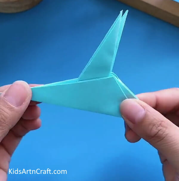 Working On The Sides-Crafting a Paper Airplane with Origami for Kids