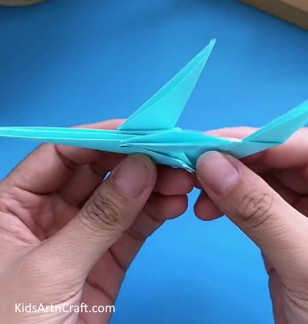 Flattening The Wings-Constructing a Paper Airplane with Origami for Little Ones