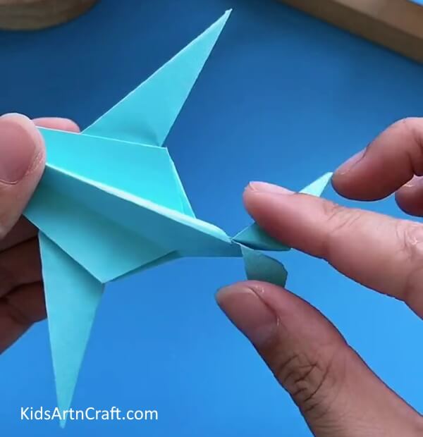 Final Flattening-Generating a Paper Aircraft through Origami for Children 
