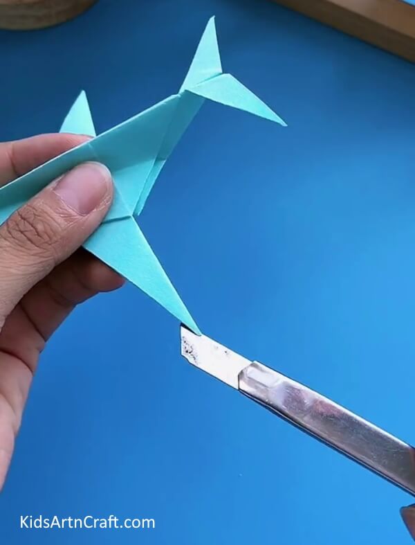 Adding Finish To The Wings-Forming a Paper Plane with Origami for Toddlers