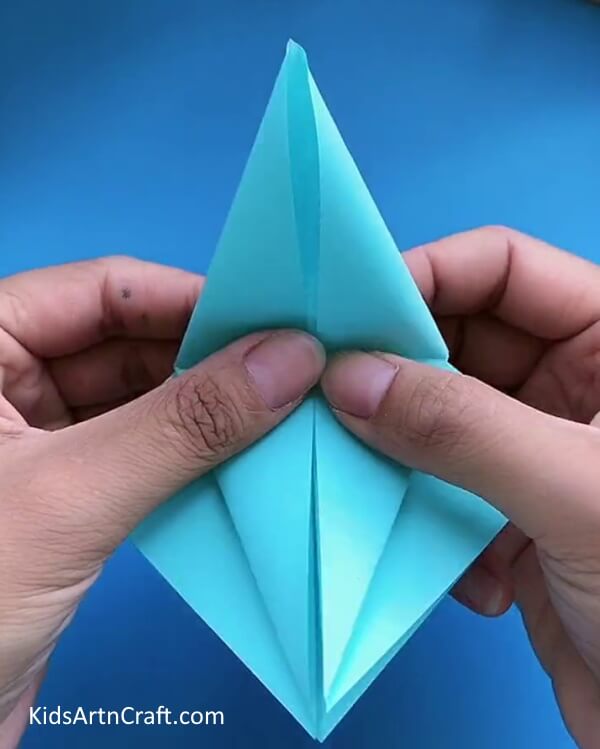 Making Many Intricate Folds- Generating a Paper Plane with Origami for Children 