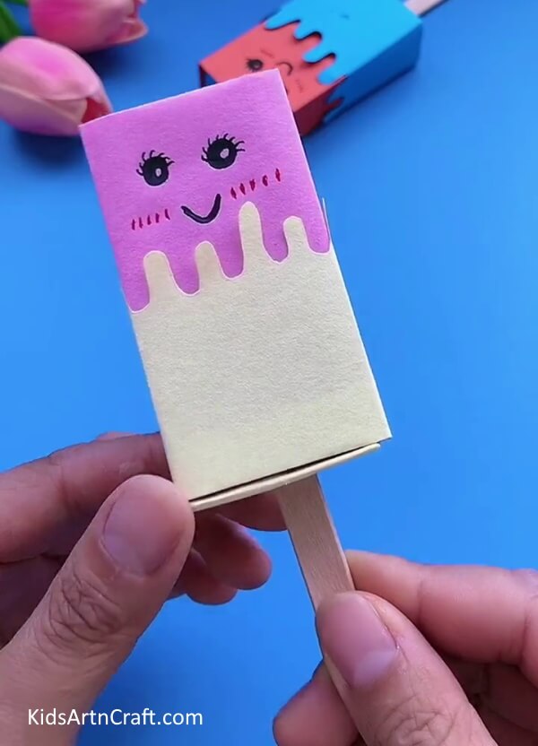 Draw Features Of Ice Cream With Black And Red Pens-Making an Ice Cream Box Craft Easily - A Tutorial For Kids 