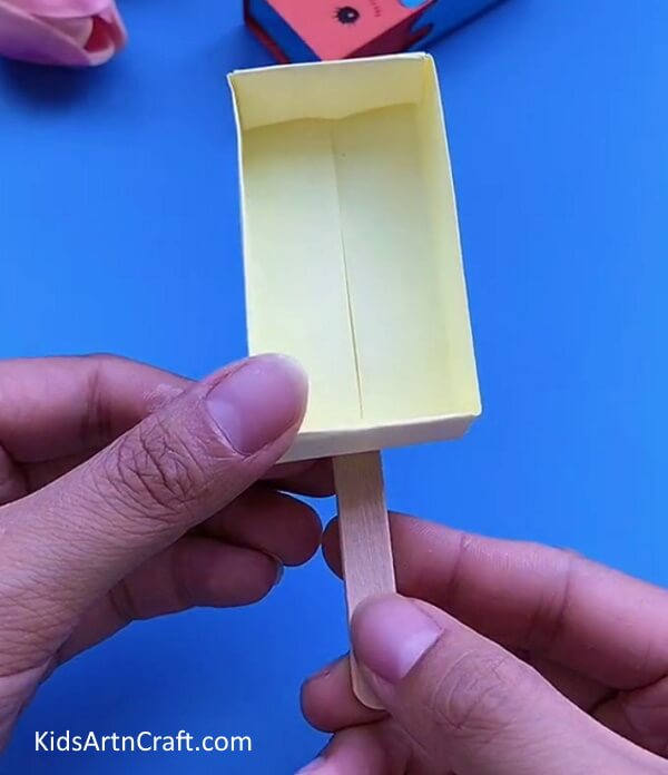 Stick The Popsicle Stick With Glue-A Fun Ice Cream Box Craft Activity For Kids 