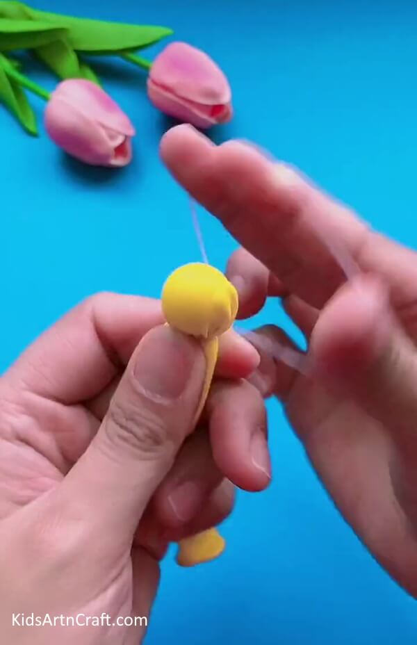 Tying The Rubber Band-A colorful lesson for young ones to learn how to create Balloon & Clay items 