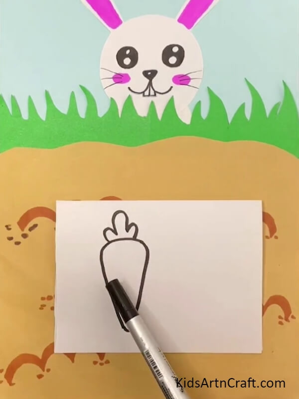 Drawing Carrot On White Paper- Crafting a Lovely Bunny Made of Carrots with Youngsters
