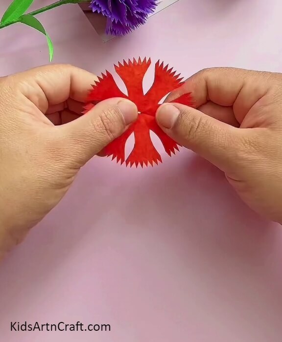 Open the Red Craft Paper- Craft Gorgeous Carnation Paper Blooms With This Tutorial for Beginners 